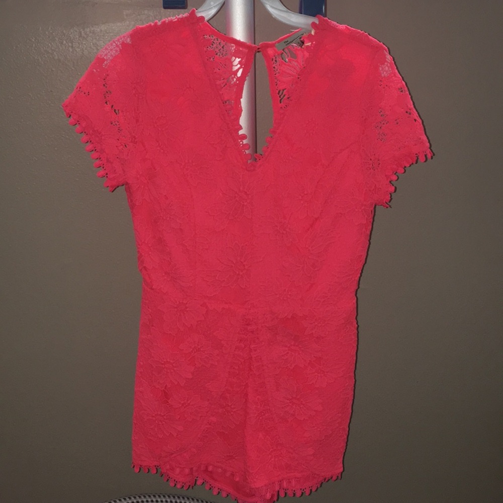 Neon pink crochet lace romper
